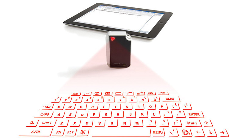 Illustration for article titled This Tiny Keychain Laser Keyboard Is Still a Waste of Space